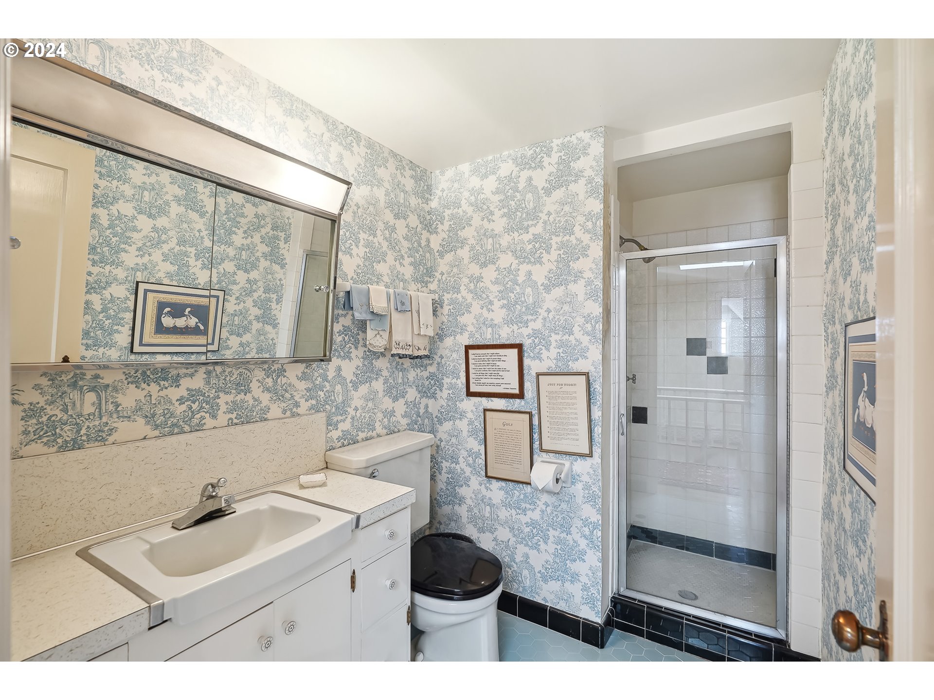 1628 Southwest College Street Portland, OR 97201 - Photo 19 of 25 a bathroom with double sink and two mirror