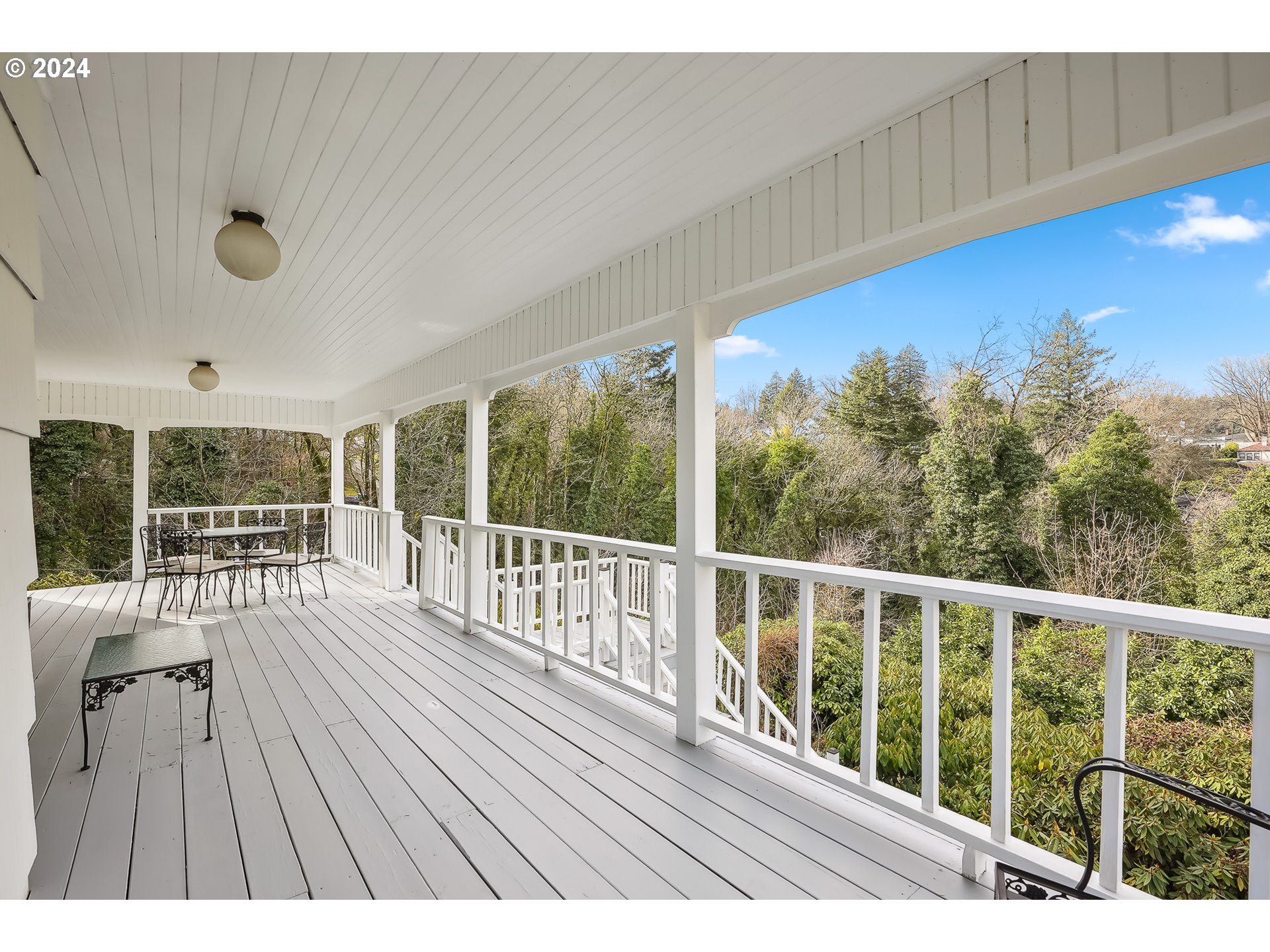 1628 Southwest College Street Portland, OR 97201 - Photo 21 of 25 a view of balcony with wooden floor & fence