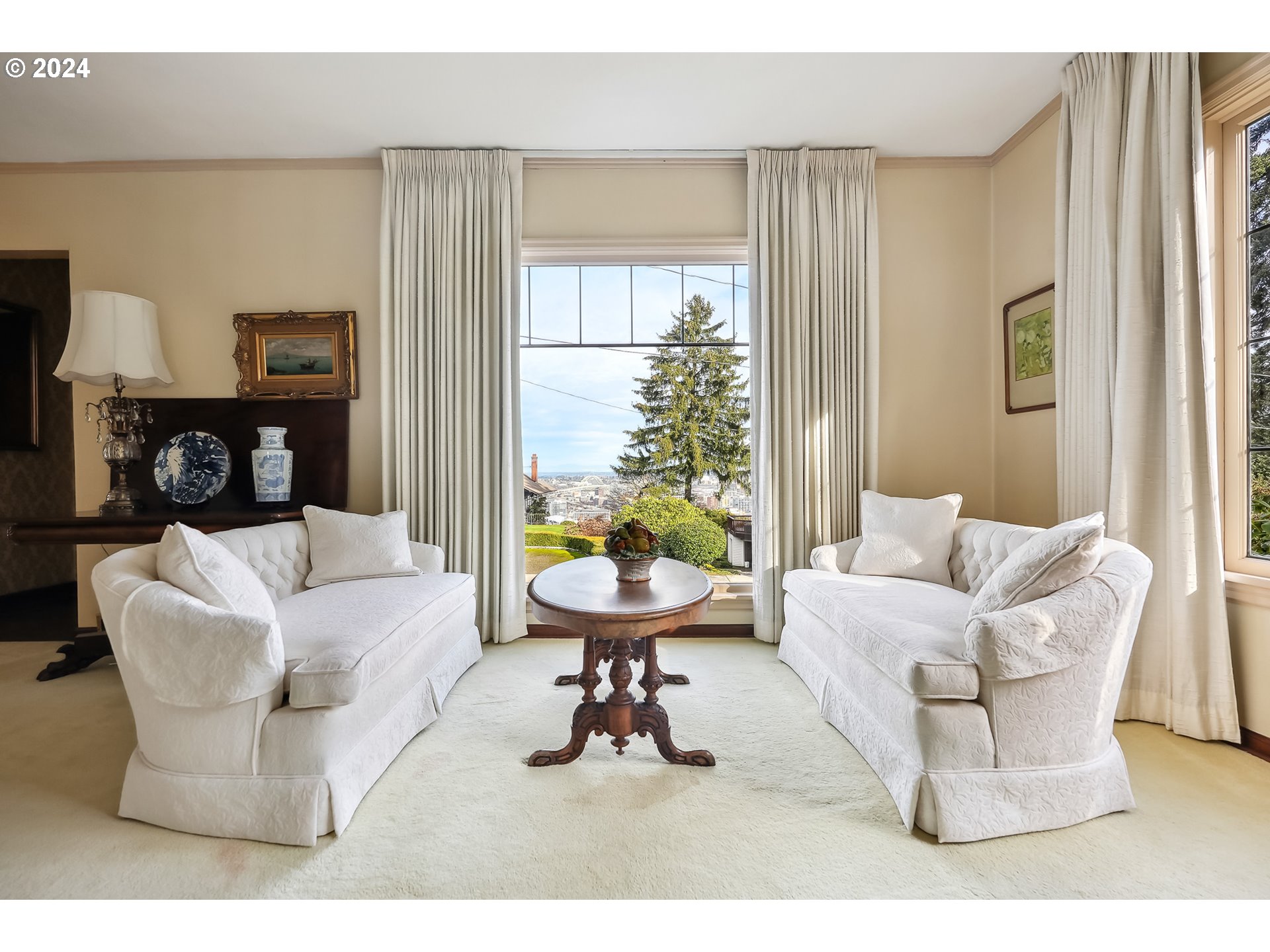 1628 Southwest College Street Portland, OR 97201 - Photo 3 of 25 a living room with furniture and a large window