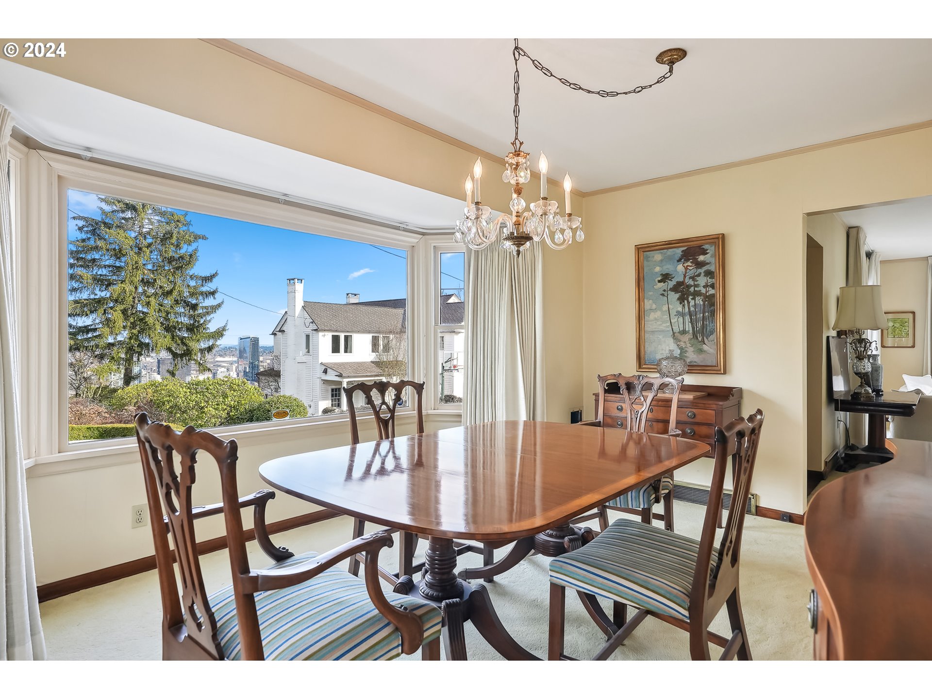 1628 Southwest College Street Portland, OR 97201 - Photo 5 of 25 a dining room with furniture a chandelier and window