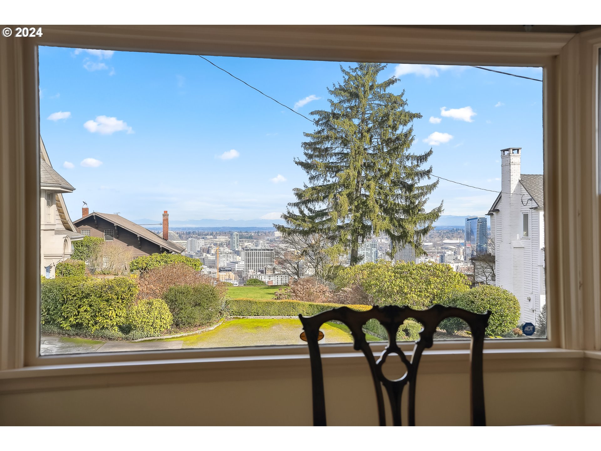 1628 Southwest College Street Portland, OR 97201 - Photo 6 of 25 a view of a living room and chandelier