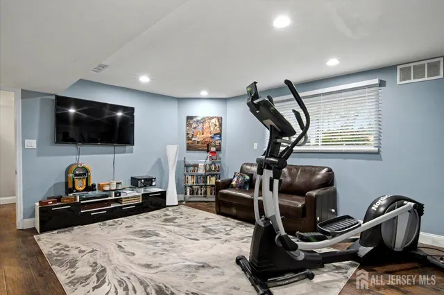 a view of a dinning table and chairs in the balcony