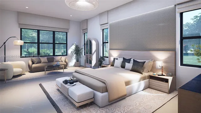 a bedroom with furniture and a large window