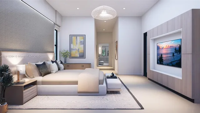 a bedroom with a large bed and a large window