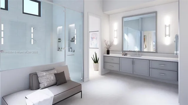 a spacious bathroom with a double vanity sink tub and mirror