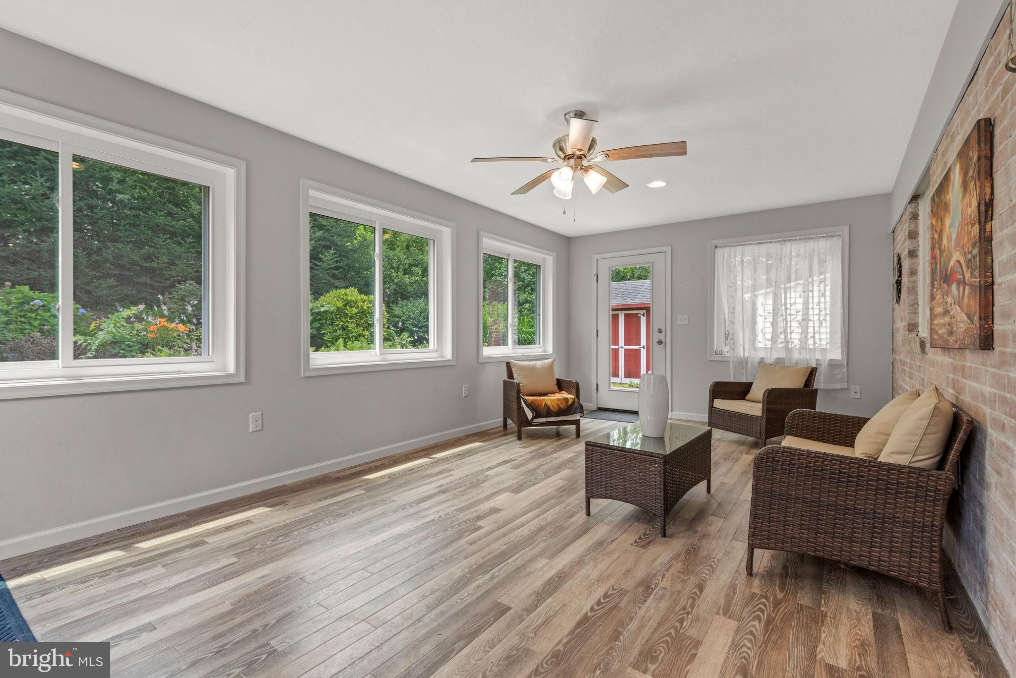 748 Clearmount Road York, PA 17403 - Photo 13 of 28 a living room with furniture and wooden floor