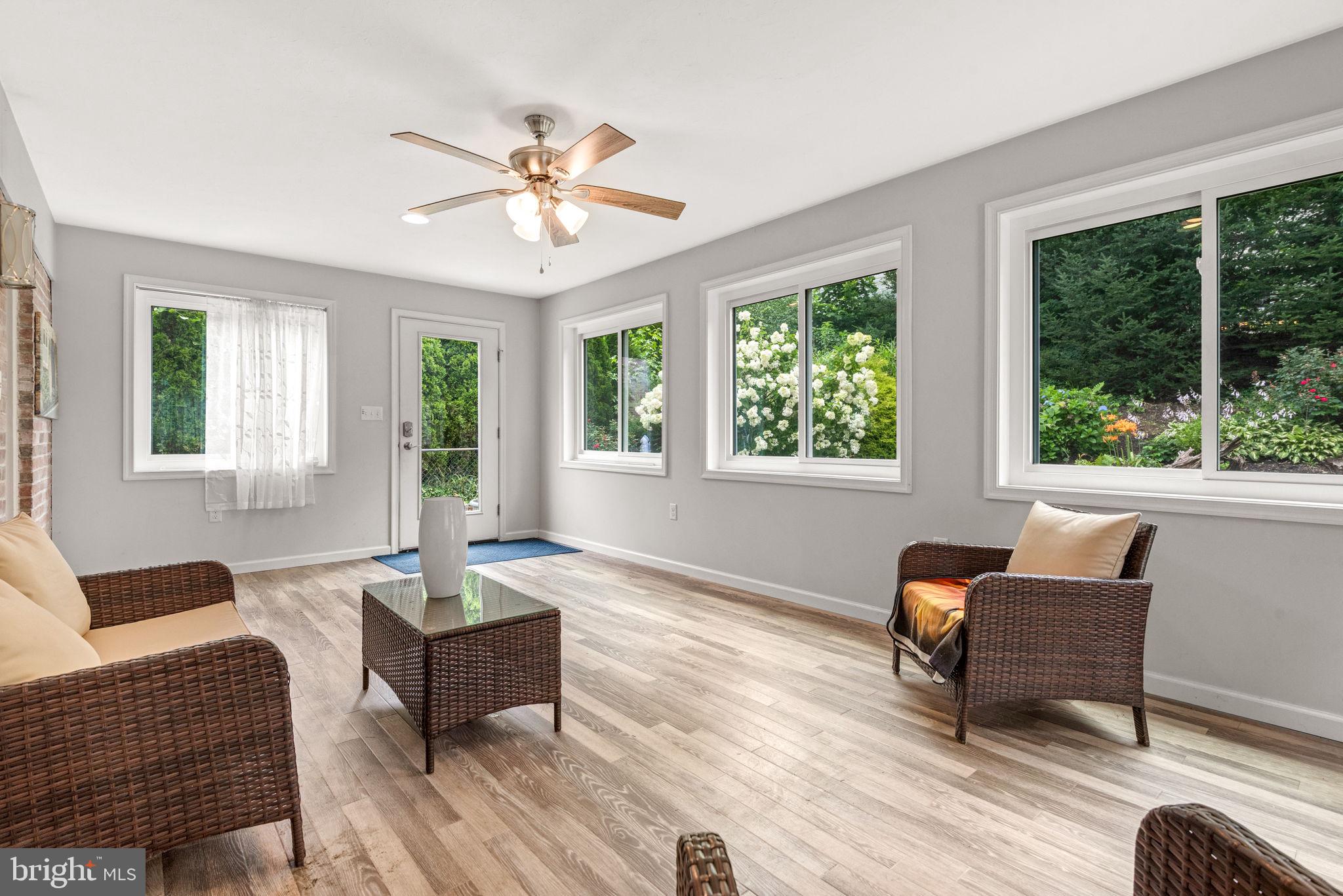 748 Clearmount Road York, PA 17403 - Photo 15 of 28 a living room with furniture and two large window