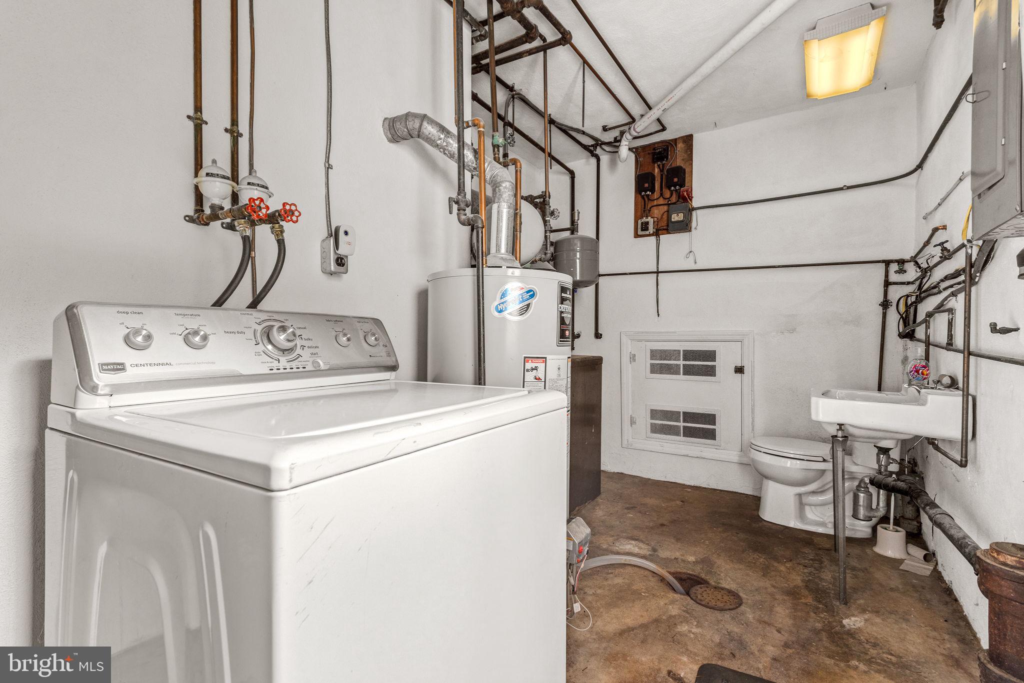 748 Clearmount Road York, PA 17403 - Photo 28 of 28 a utility room with dryer and washer