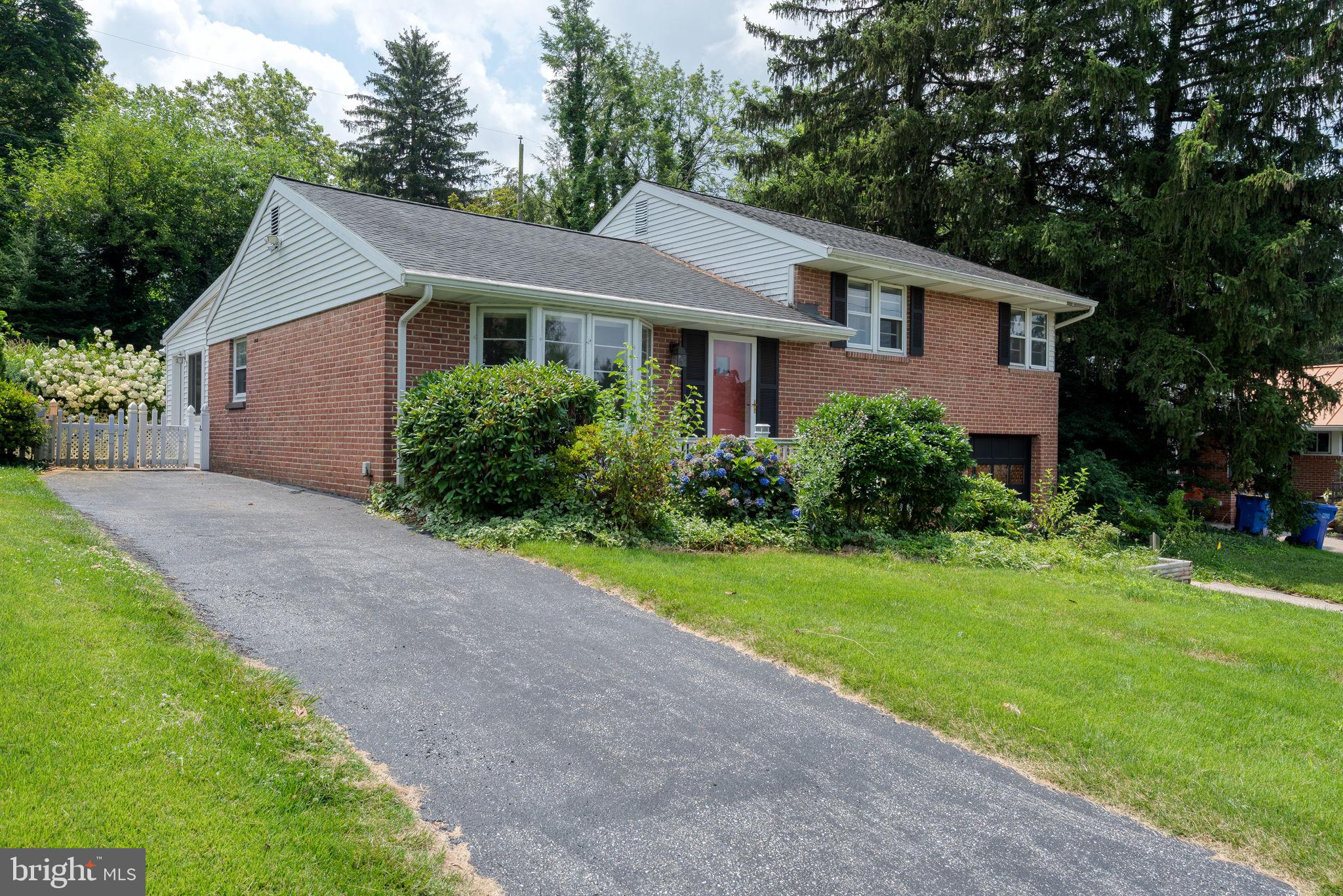 748 Clearmount Road York, PA 17403 - Photo 3 of 28 a front view of house with yard and green space