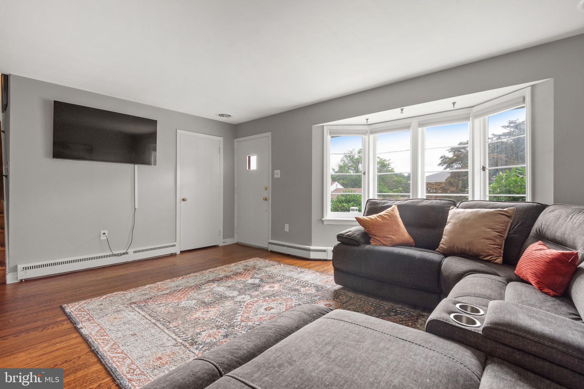748 Clearmount Road York, PA 17403 - Photo 6 of 28 a living room with furniture and a rug