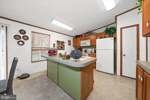 $299,000 | 22896 Cypress Drive, Lewes, DE 19958