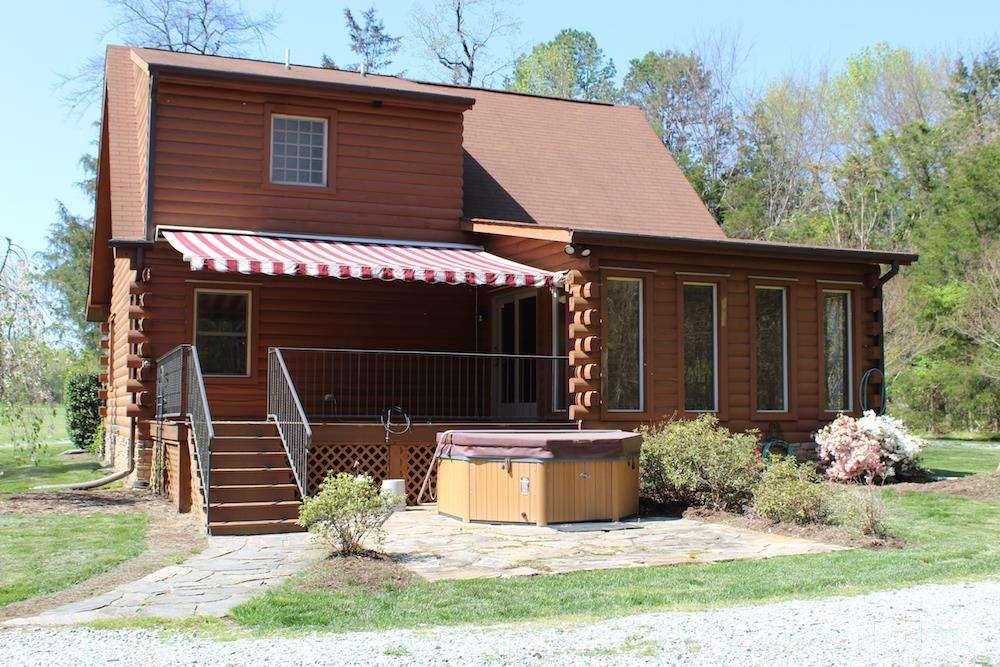 5214 Gray Road Timberlake, NC 27583 - Photo 5 of 30 includes back deck with awning