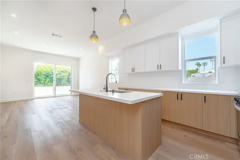 an empty room with wooden floor