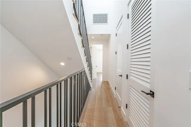 a view of a hallway with staircase
