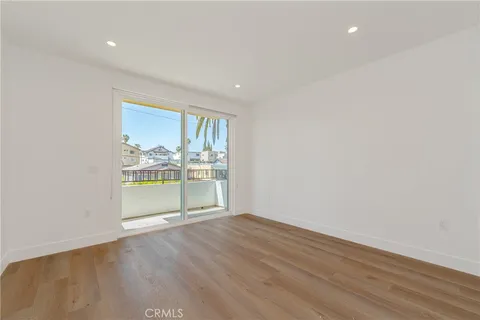 a view of a house with a tree