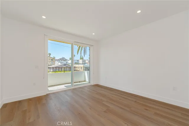 a view of a house with a tree
