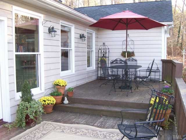 8525 Kempton Road Raleigh, NC 27615 - Photo 12 of 12 Oversized deck overlooks large fenced yard Patio/Deck