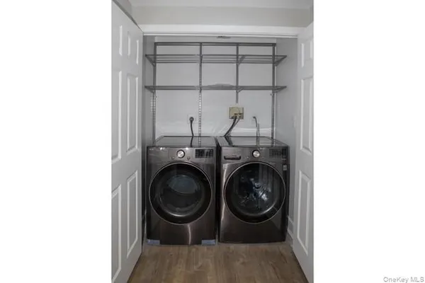 a utility room with dryer and washer