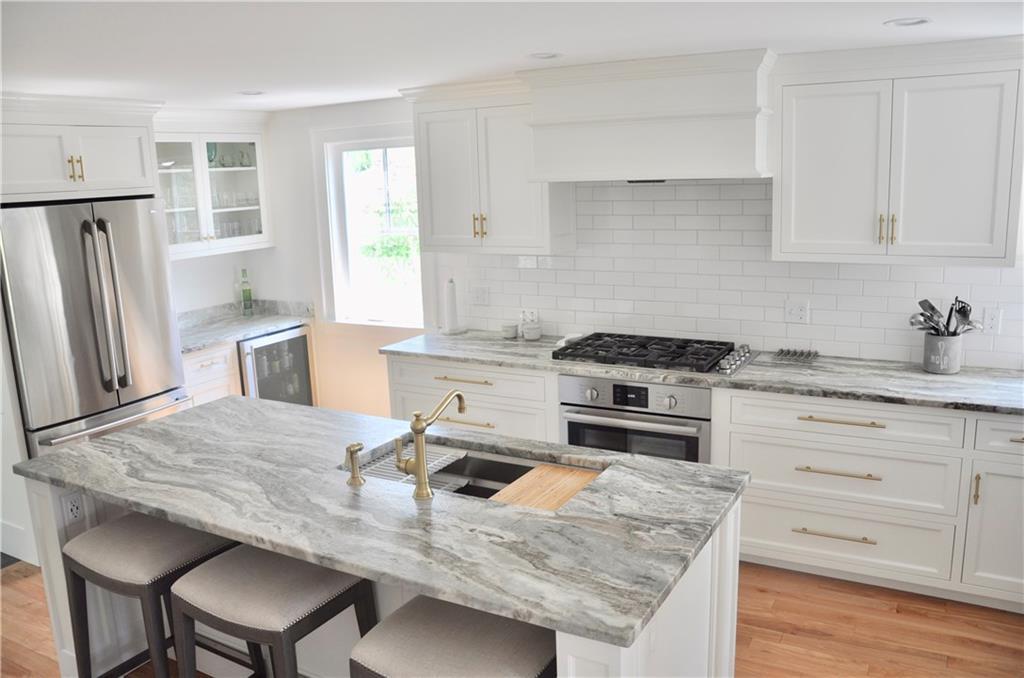14 Sykes Road Pemaquid, ME 04558 - Photo 2 of 15 This kitchen features leathered...