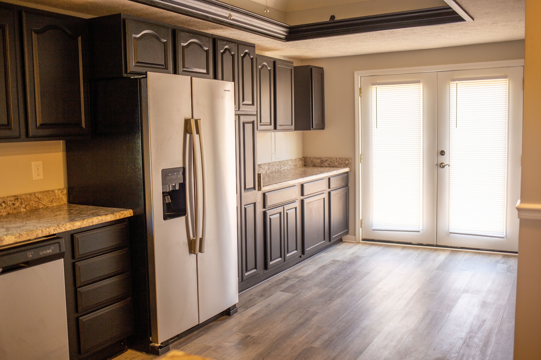 125 Corinth Road Portland, TN 37148 - Photo 17 of 30 a kitchen with stainless steel appliances granite countertop a refrigerator and a sink