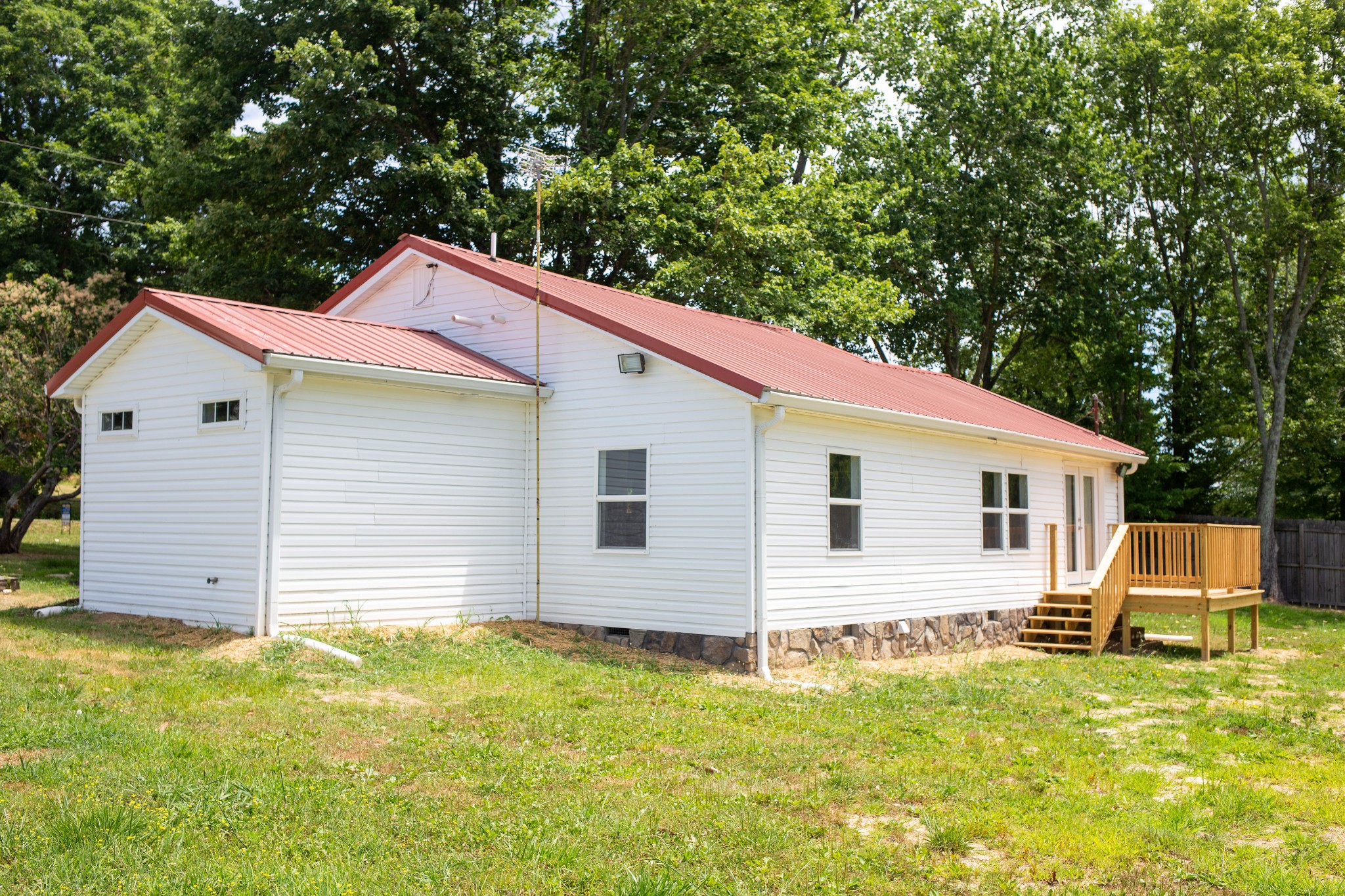 125 Corinth Road Portland, TN 37148 - Photo 2 of 30 a front view of house with yard and trees in the background