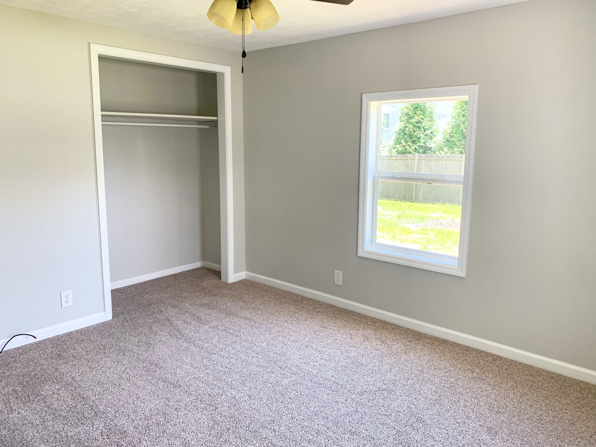 125 Corinth Road Portland, TN 37148 - Photo 23 of 30 an empty room with windows and closet