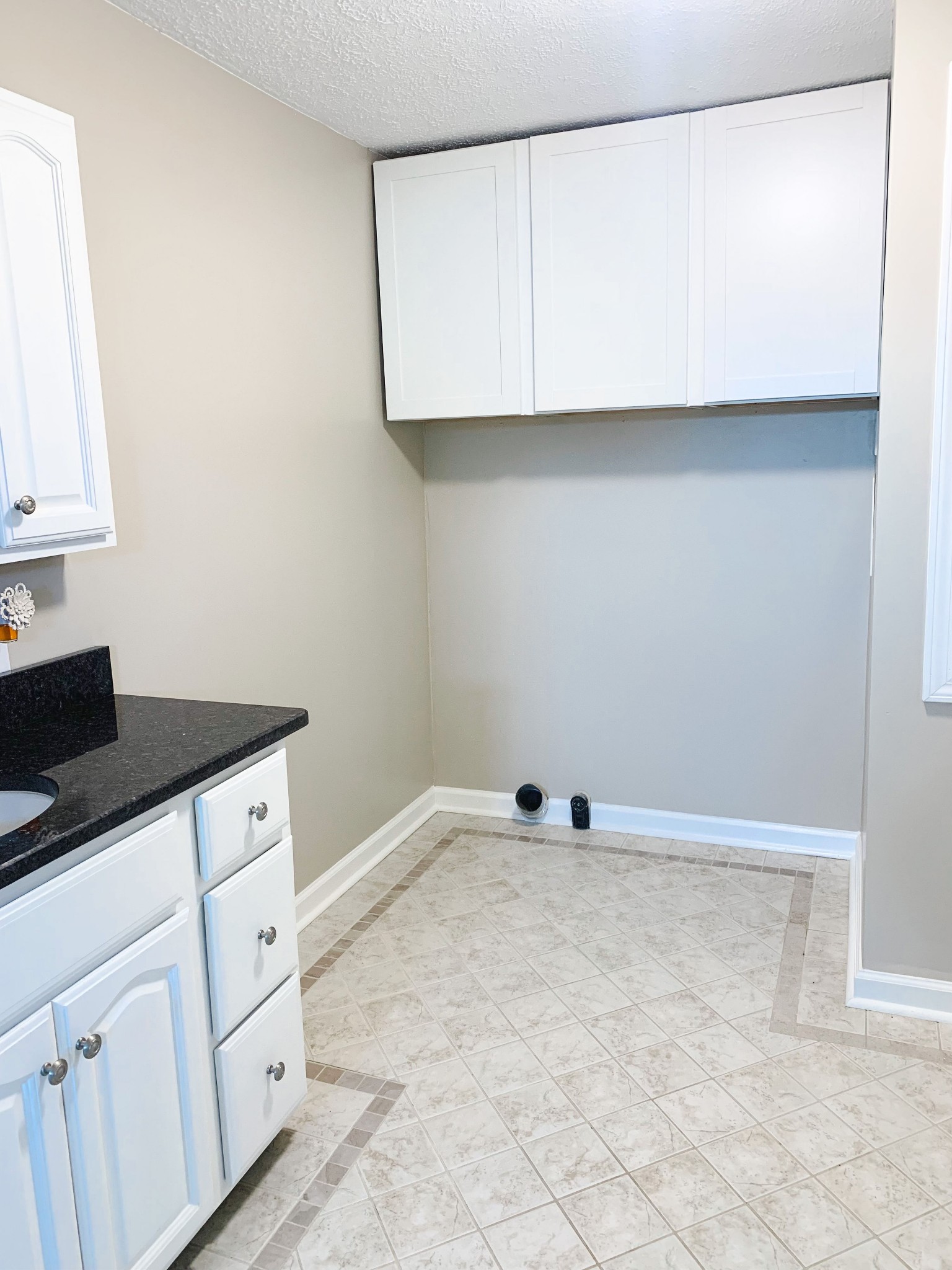 125 Corinth Road Portland, TN 37148 - Photo 28 of 30 a view of cabinets with racks on the wall