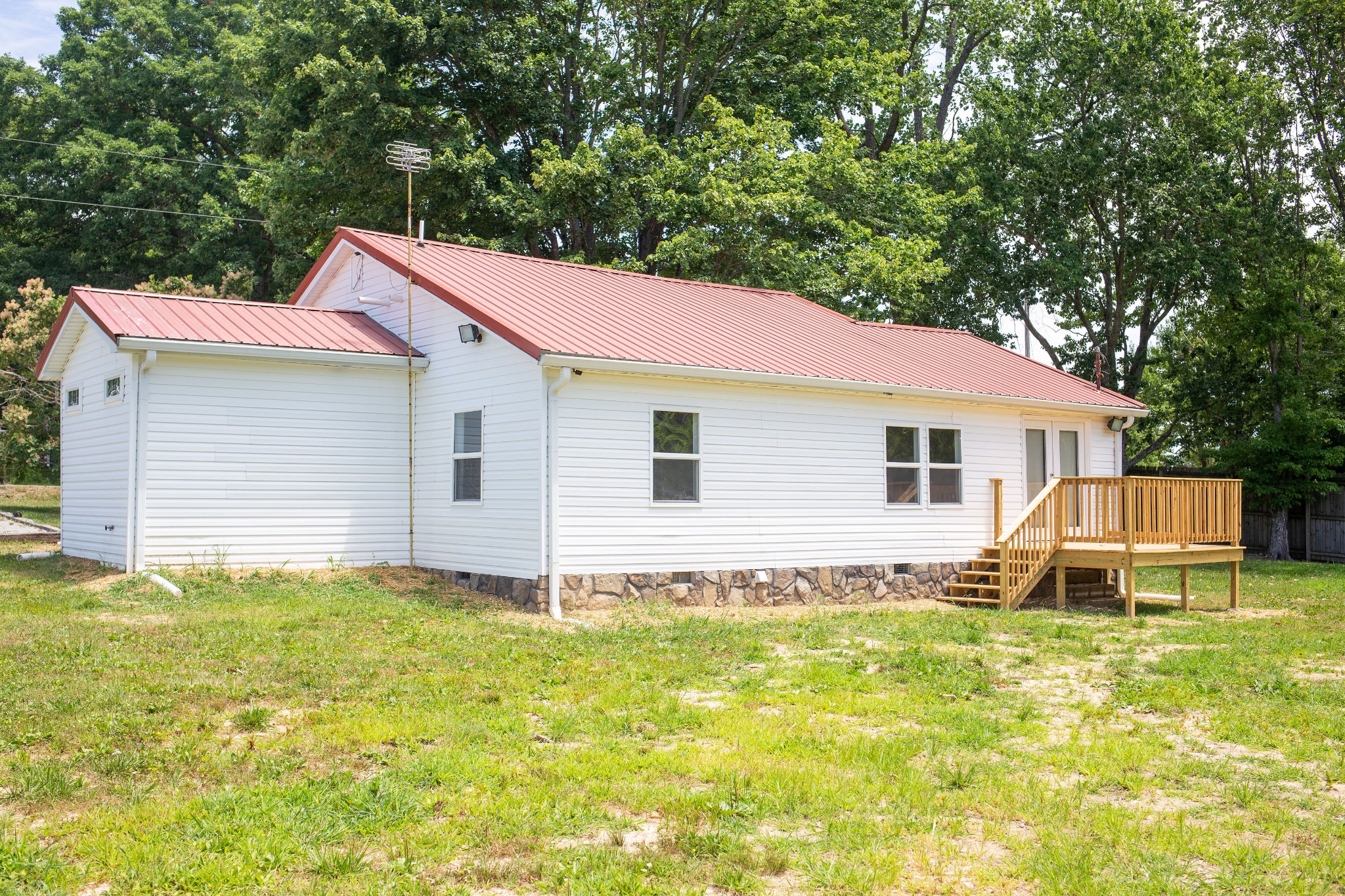 125 Corinth Road Portland, TN 37148 - Photo 3 of 30 a view of a house with a yard and sitting area