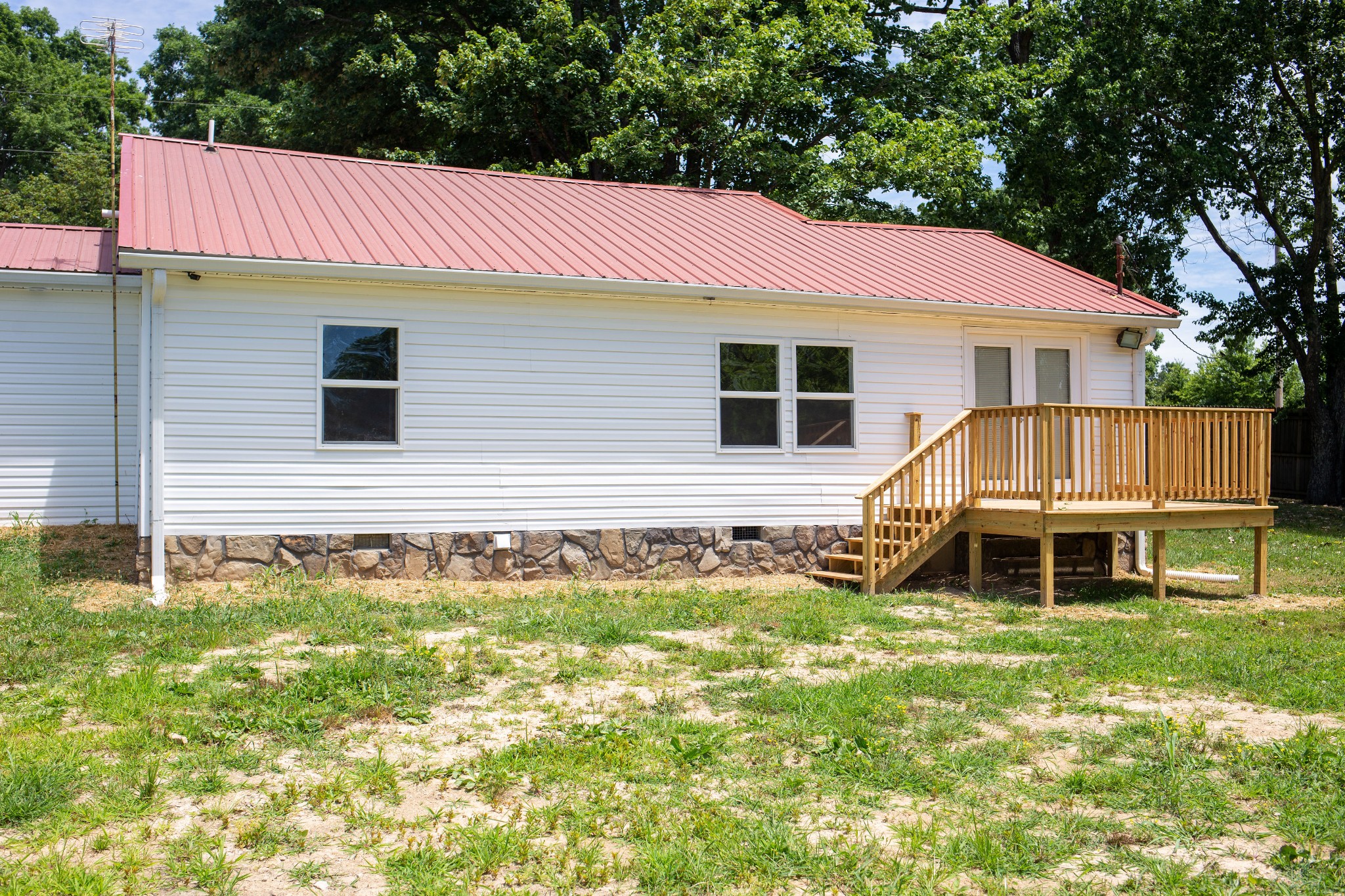 125 Corinth Road Portland, TN 37148 - Photo 5 of 30 a front view of a house with a yard