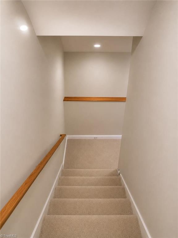 215 Clubmoss Way Clemmons, NC 27012 - Photo 15 of 30 Stairway to the finished basement