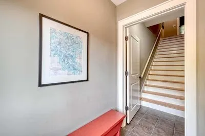 a view of a hallway with staircase
