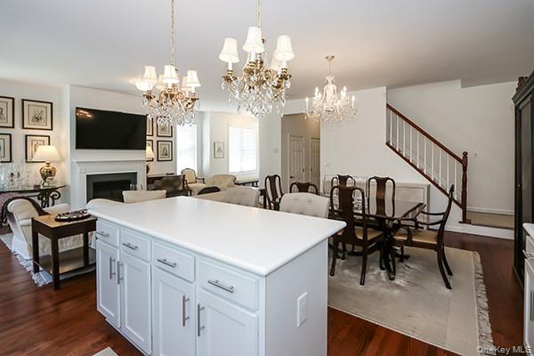 4 Spring Court Huntington, NY 11743 - Photo 37 of 38 a view of a dining room with furniture and a chandelier
