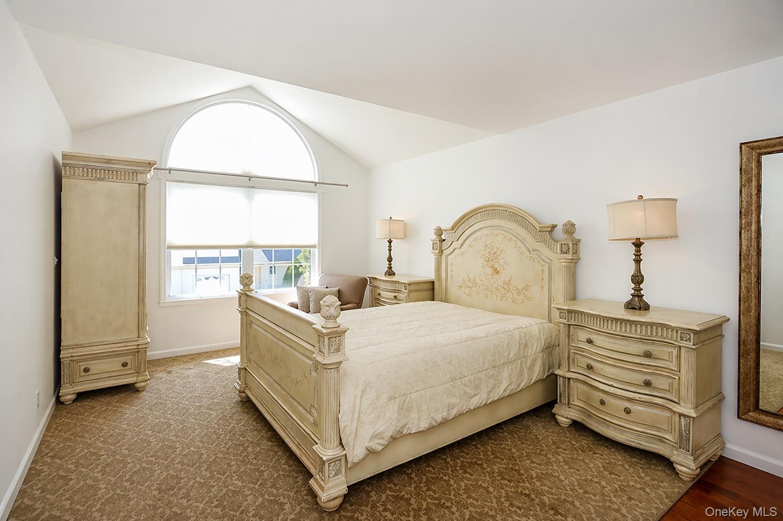 4 Spring Court Huntington, NY 11743 - Photo 18 of 38 a bedroom with a bed and a dresser next to it