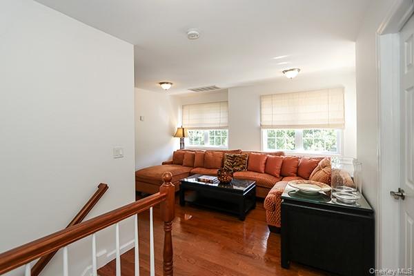 4 Spring Court Huntington, NY 11743 - Photo 20 of 38 a living room with furniture and a window