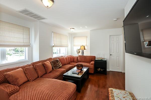 4 Spring Court Huntington, NY 11743 - Photo 21 of 38 a living room with furniture and a wooden floor