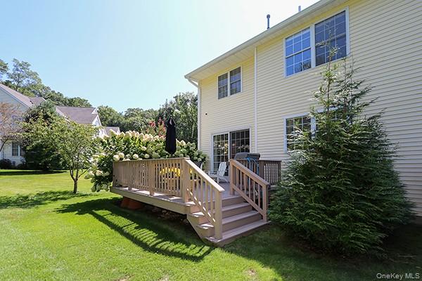 4 Spring Court Huntington, NY 11743 - Photo 28 of 38 a view of a house with a yard
