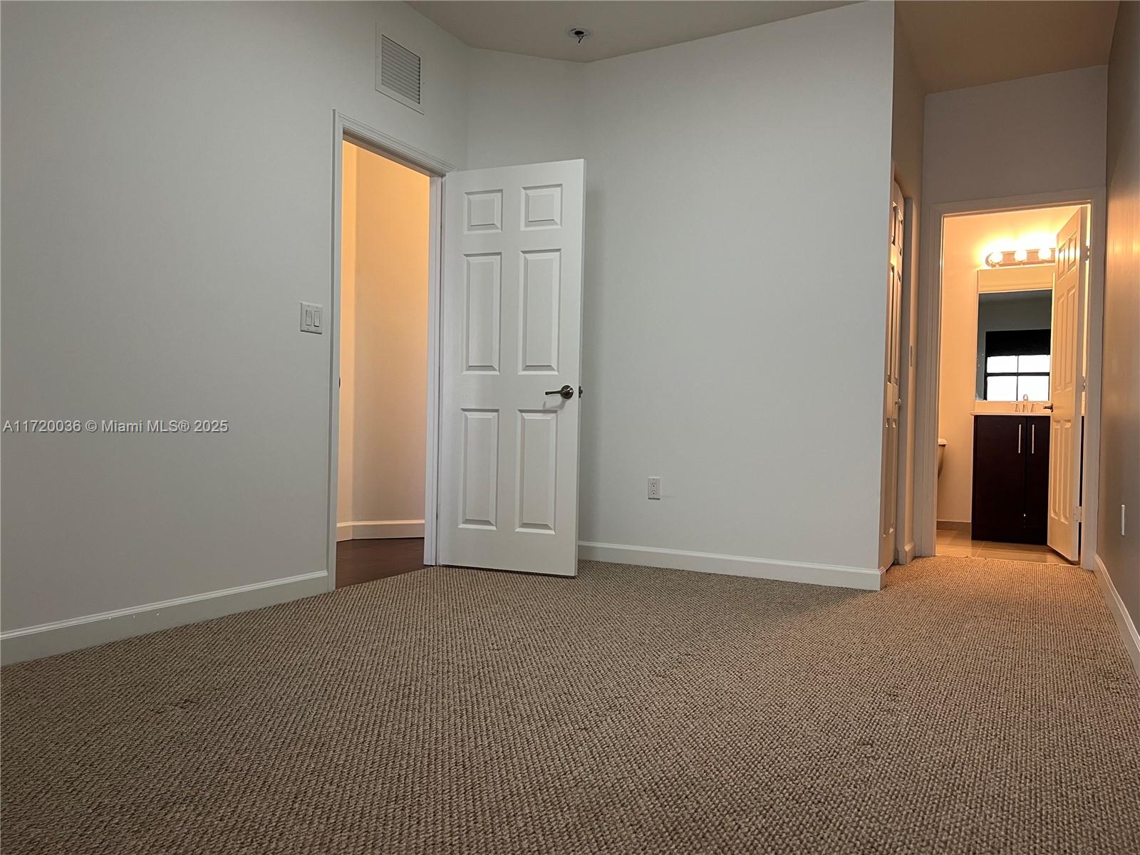 Doral Doral, FL 33178 - Photo 14 of 32 a view of an empty room with closet and a window