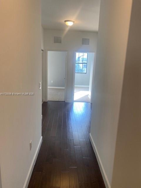 Doral Doral, FL 33178 - Photo 15 of 32 a view of hallway with wooden floor