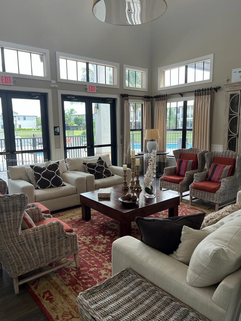 Doral Doral, FL 33178 - Photo 26 of 32 a living room with furniture and large windows