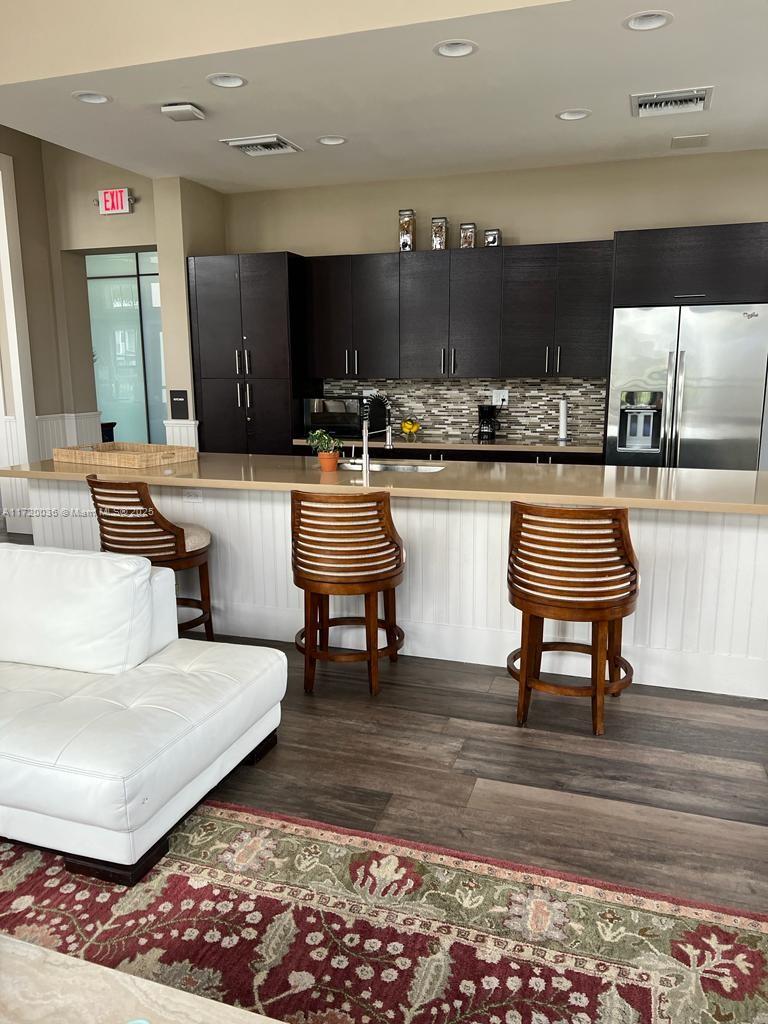 Doral Doral, FL 33178 - Photo 29 of 32 a living room with couches and a potted plant