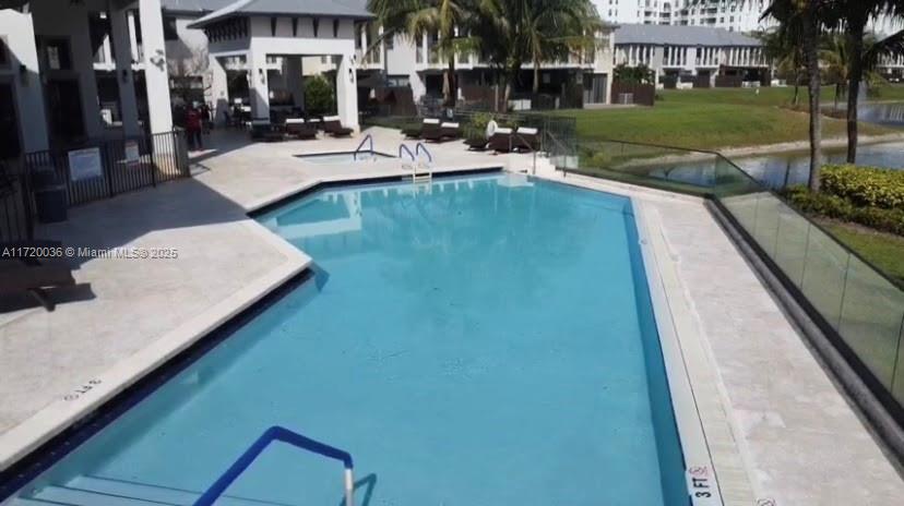 Doral Doral, FL 33178 - Photo 31 of 32 a view of a house with a swimming pool