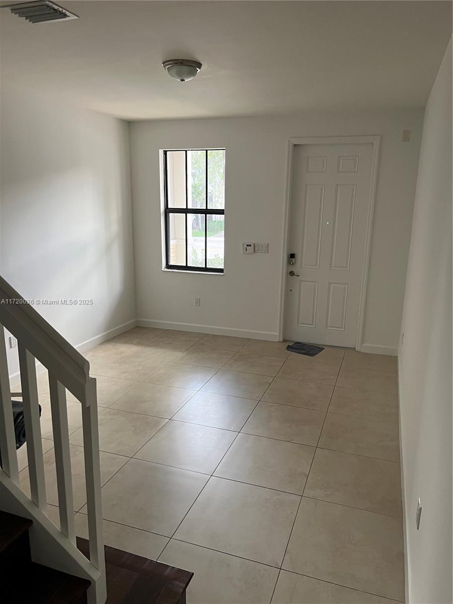 Doral Doral, FL 33178 - Photo 7 of 32 a view of an empty room with a window