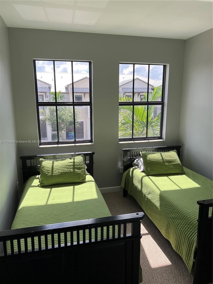 Doral Doral, FL 33178 - Photo 9 of 32 a room with two beds and a window