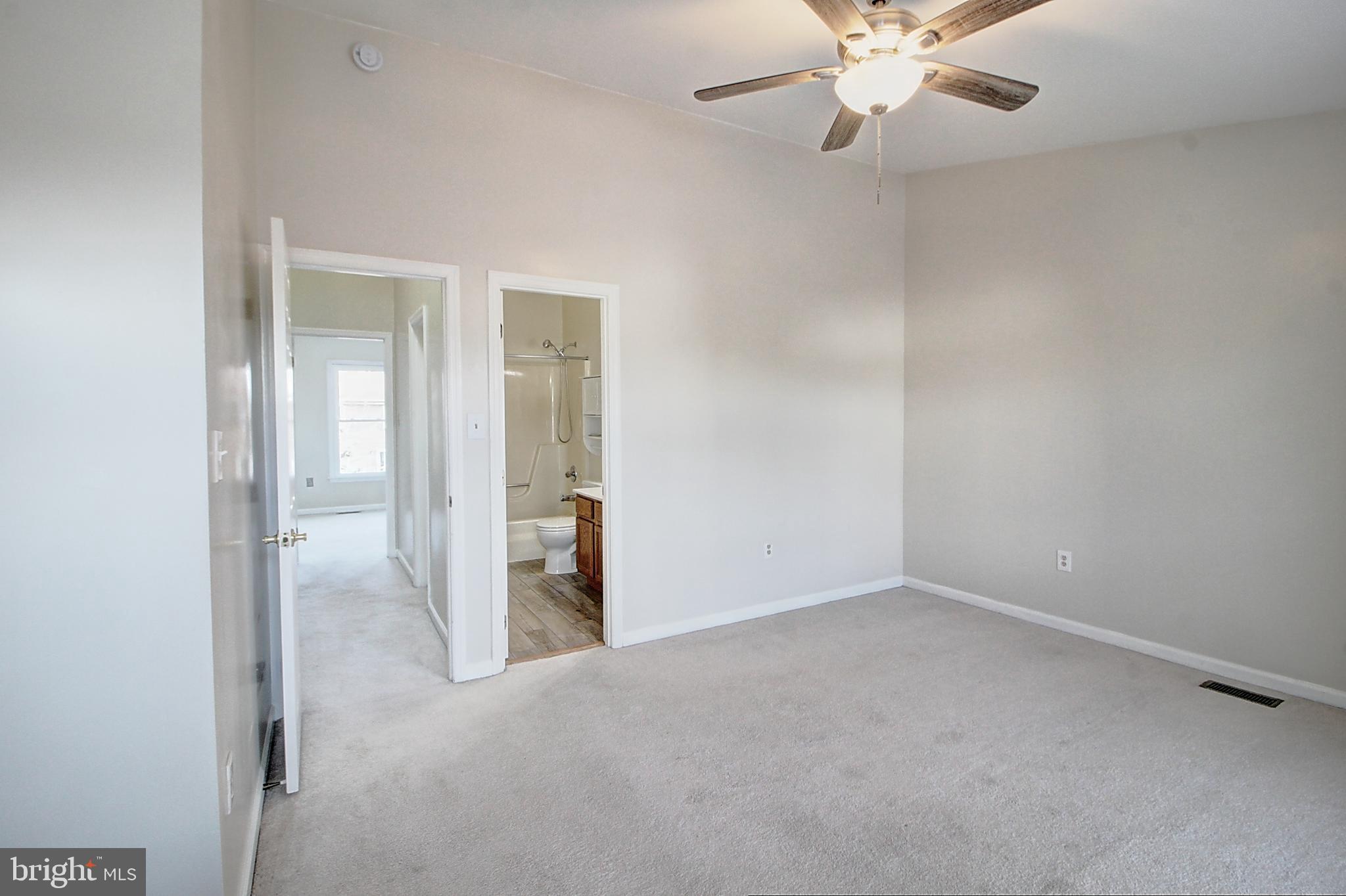 42 Victoria Square Frederick, MD 21702 - Photo 14 of 21 an empty room with a bathroom