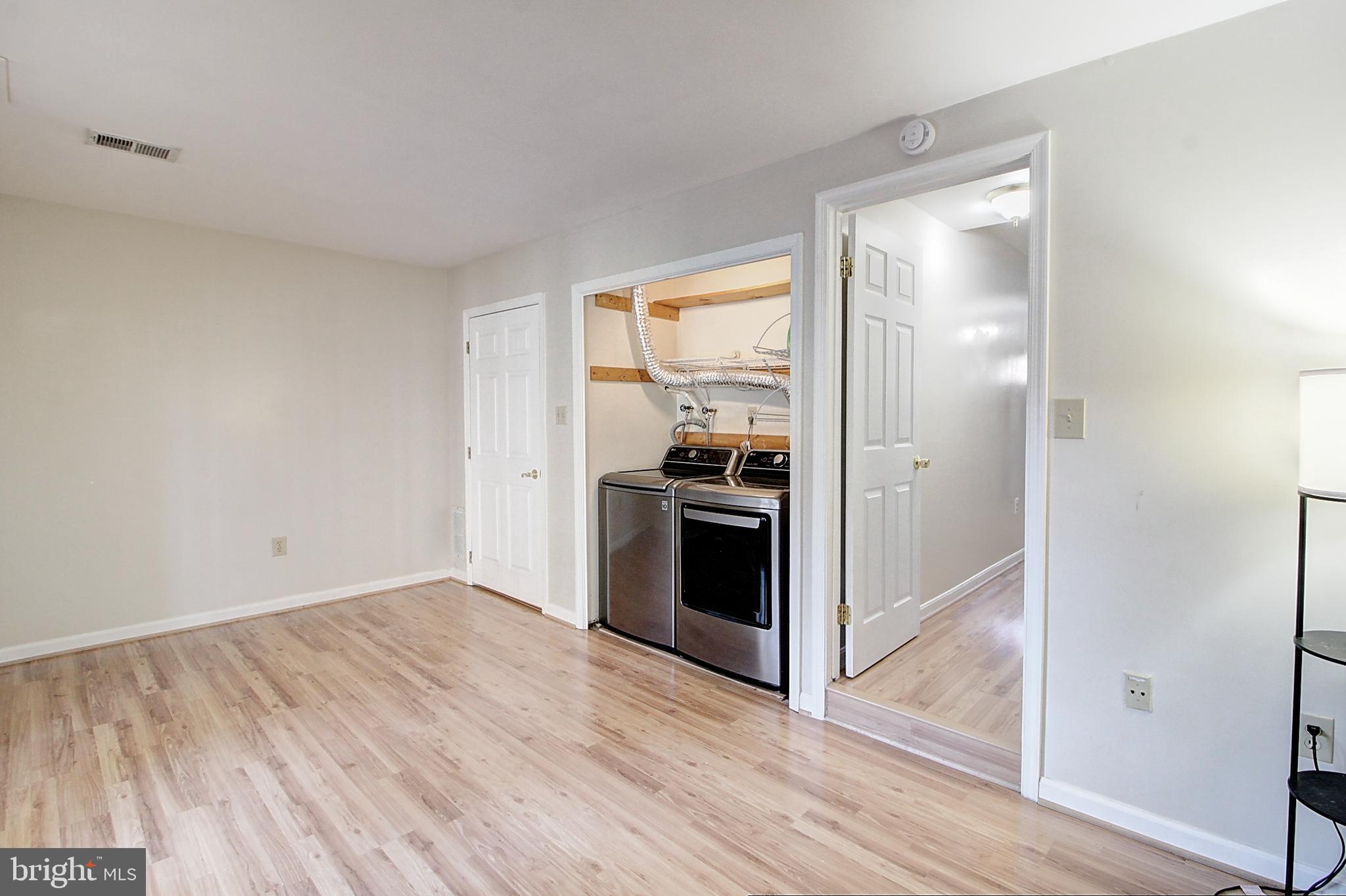 42 Victoria Square Frederick, MD 21702 - Photo 18 of 21 a view of kitchen and wooden floor