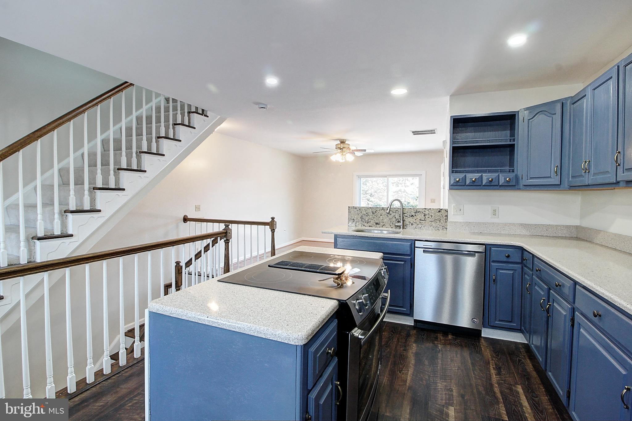 42 Victoria Square Frederick, MD 21702 - Photo 5 of 21 a kitchen with sink cabinets and stove