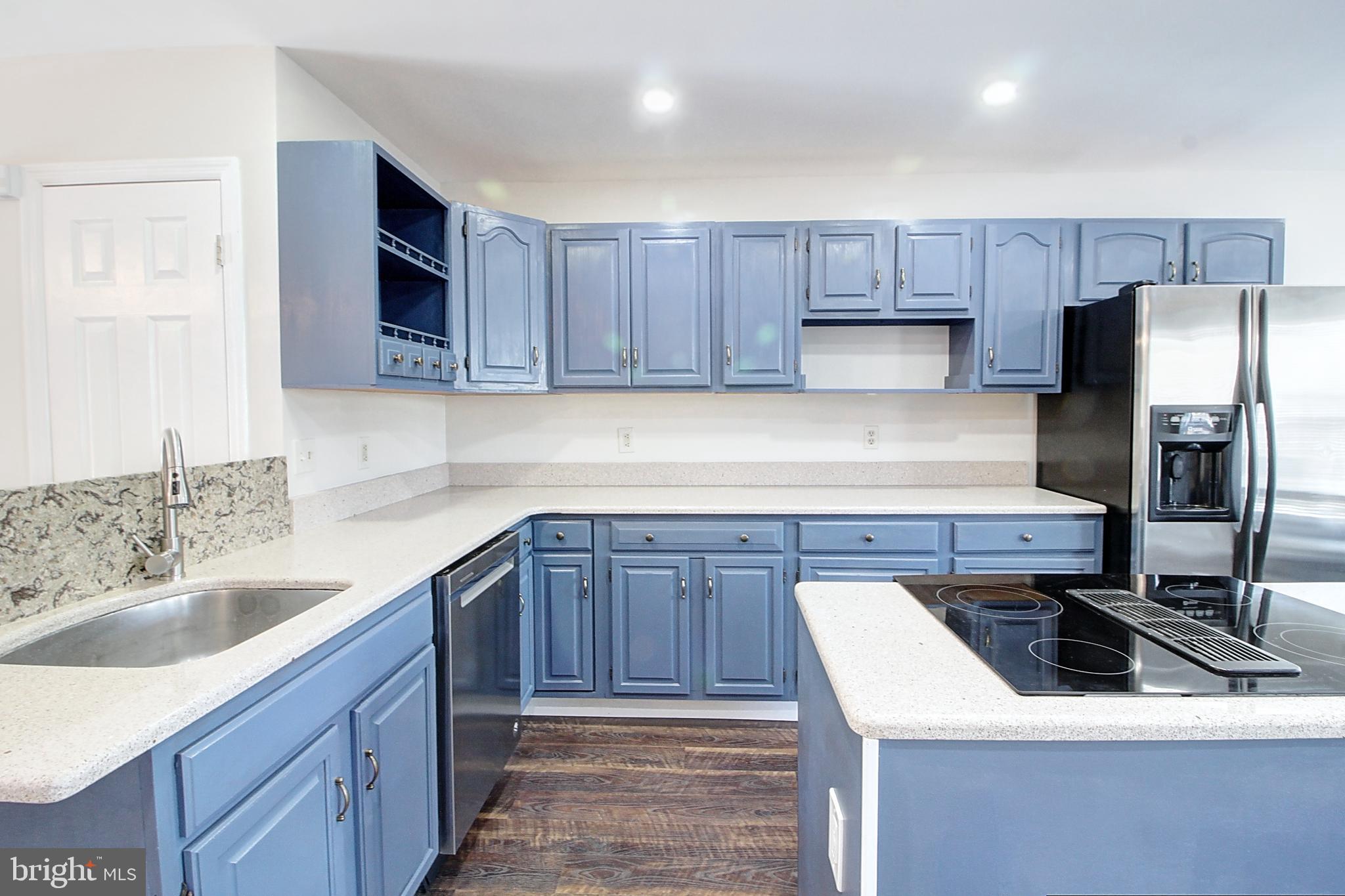 42 Victoria Square Frederick, MD 21702 - Photo 6 of 21 a kitchen with a sink stove and refrigerator