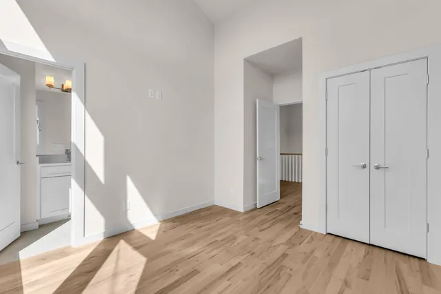 a view of entryway with wooden floor