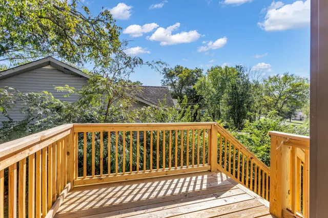 a view of deck and garden