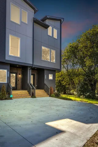 a front view of a multi story residential apartment building